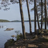  Two people paddling in the Swedish archipelago.