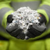Shredded paper in the hands of a Stena Confidential employee