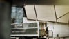 A Stena Confidential employee handles a container in a truck.