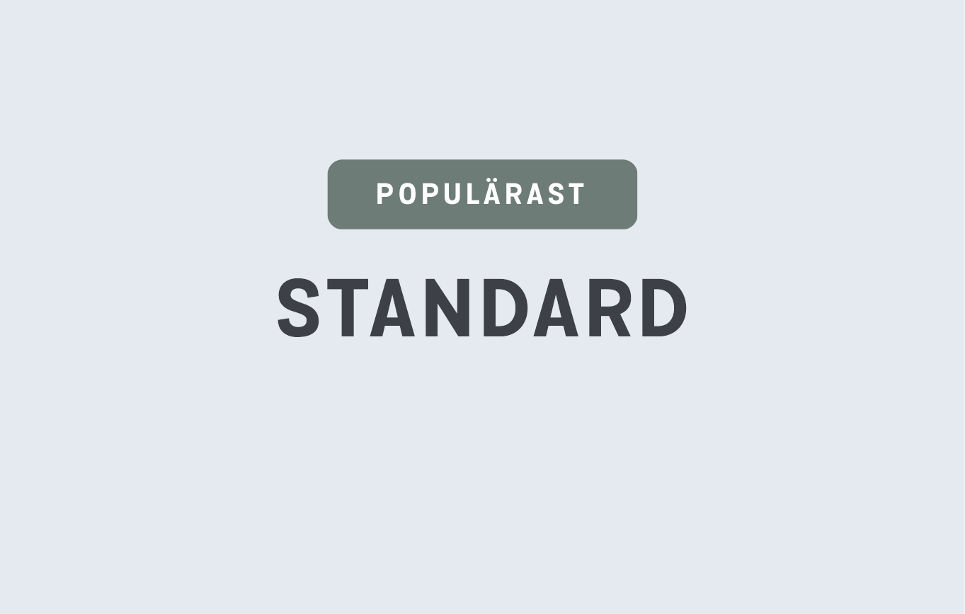 Texten "STANDARD" skrivet på en ljusblå bakgrund.